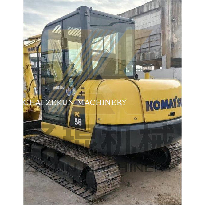 Подержанный экскаватор Komatsu PC56 с вместимостью в 0.2 м3 и рабочими часами 0-2000