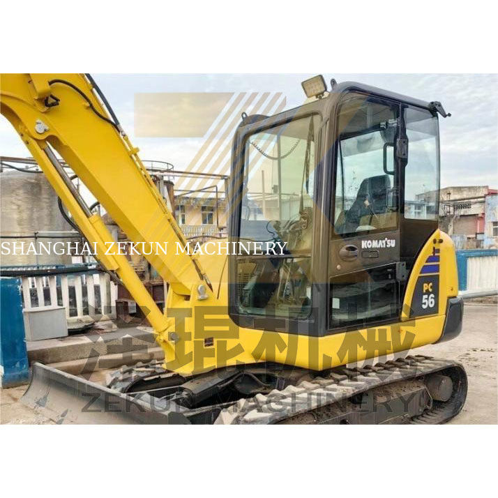 Подержанный экскаватор Komatsu PC56 с вместимостью в 0.2 м3 и рабочими часами 0-2000