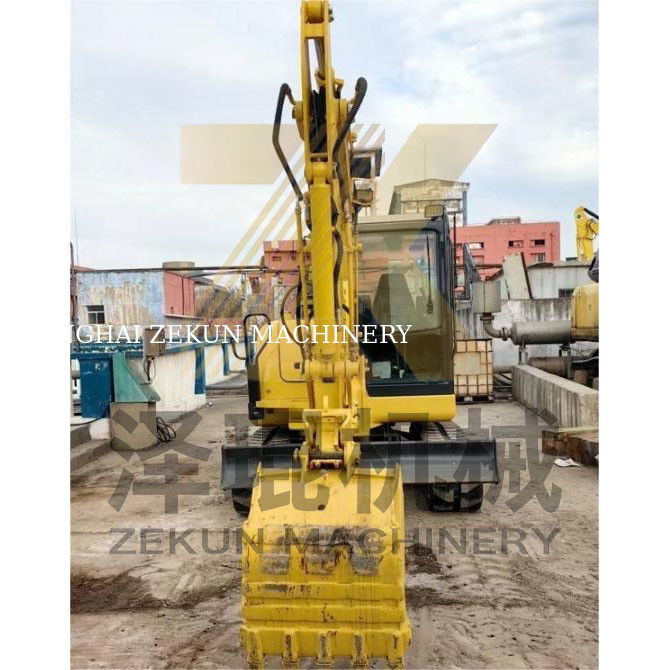 Подержанный экскаватор Komatsu PC56 с вместимостью в 0.2 м3 и рабочими часами 0-2000