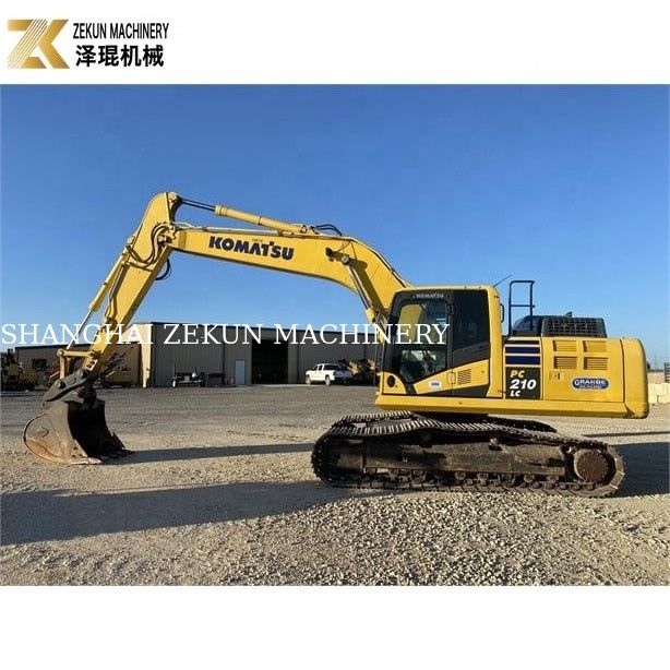 Подержанный экскаватор Komatsu PC 210-LC 7 с резиновыми подушками 20900 кг