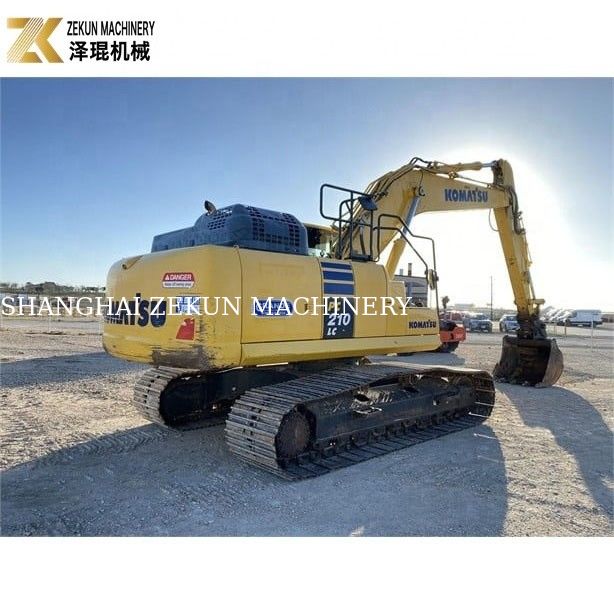 Подержанный экскаватор Komatsu PC 210-LC 7 с резиновыми подушками 20900 кг